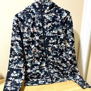 Gently used Lululemon Scuba full zip hoodie, cherry blossom design, size 6